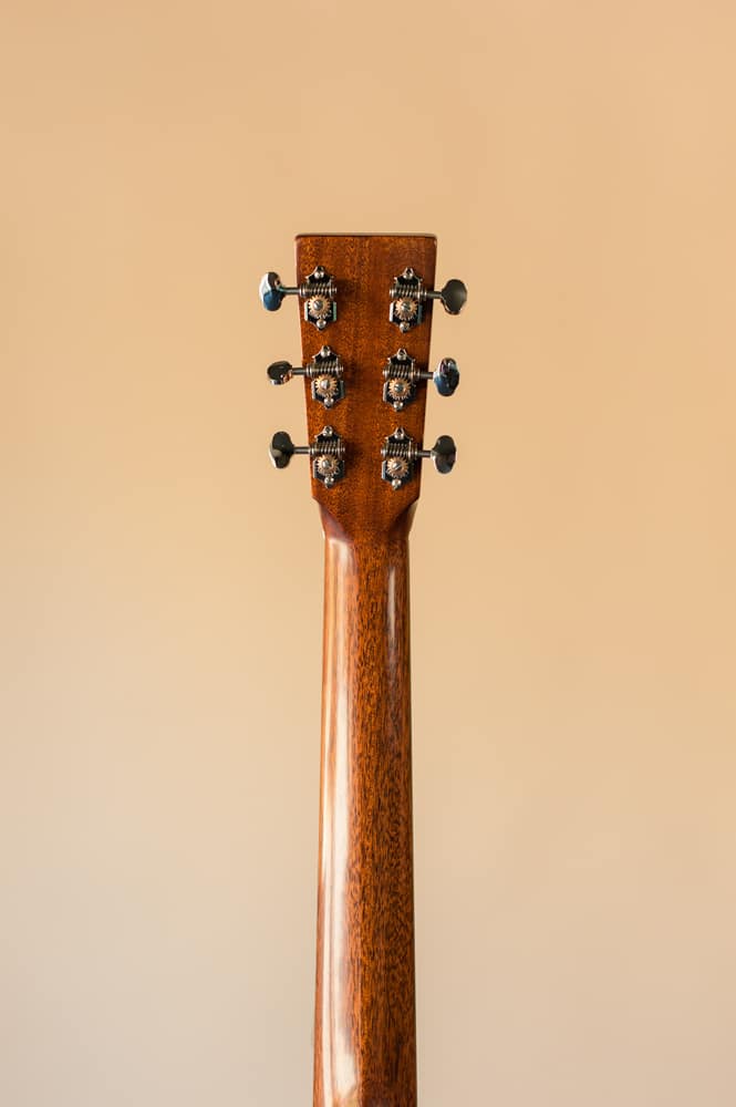 Acoustic dreadnought guitar handcrafted of mahogany back and sides with an adirondack top. Full neck back