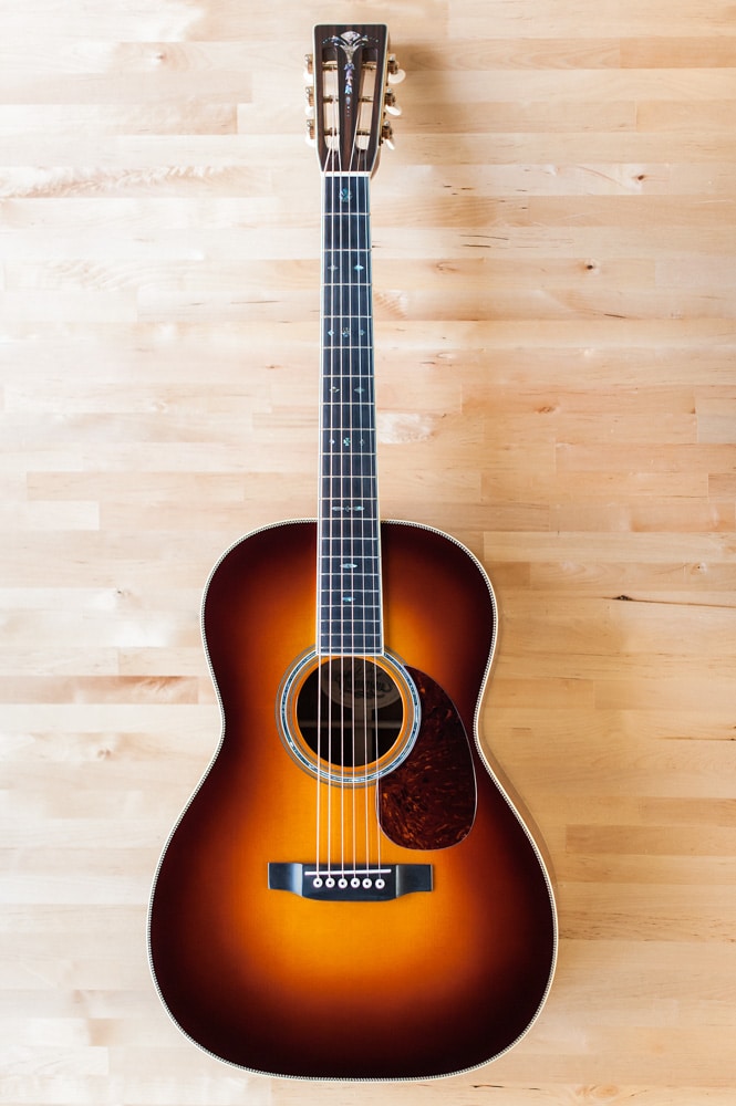 12 Fret 000 acoustic guitar handcrafted from Adirondack Spruce and Brazilian Rosewood.
