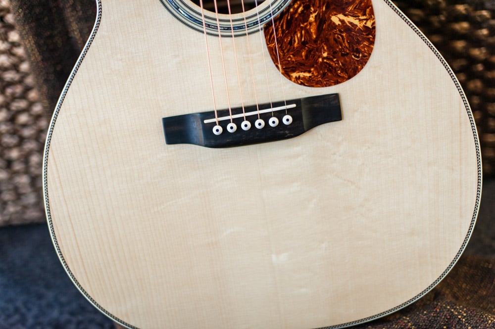 Preston Thompson Acoustic Guitars Brazilian Rosewood 14 Fret 000 acoustic guitar with custom abalone inlays. Body close