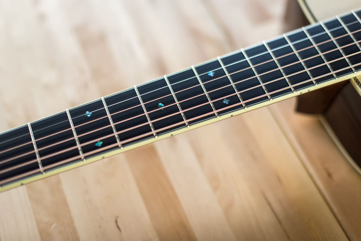 custom inlay om acoustic guitar