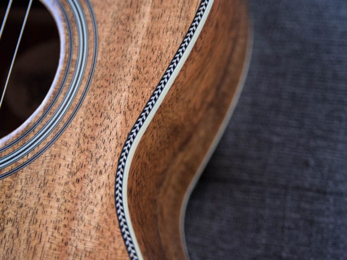 handcrafted acoustic parlor guitar