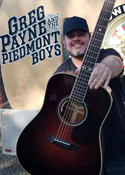 Featured artist, Greg Payne with his Thompson Guitar